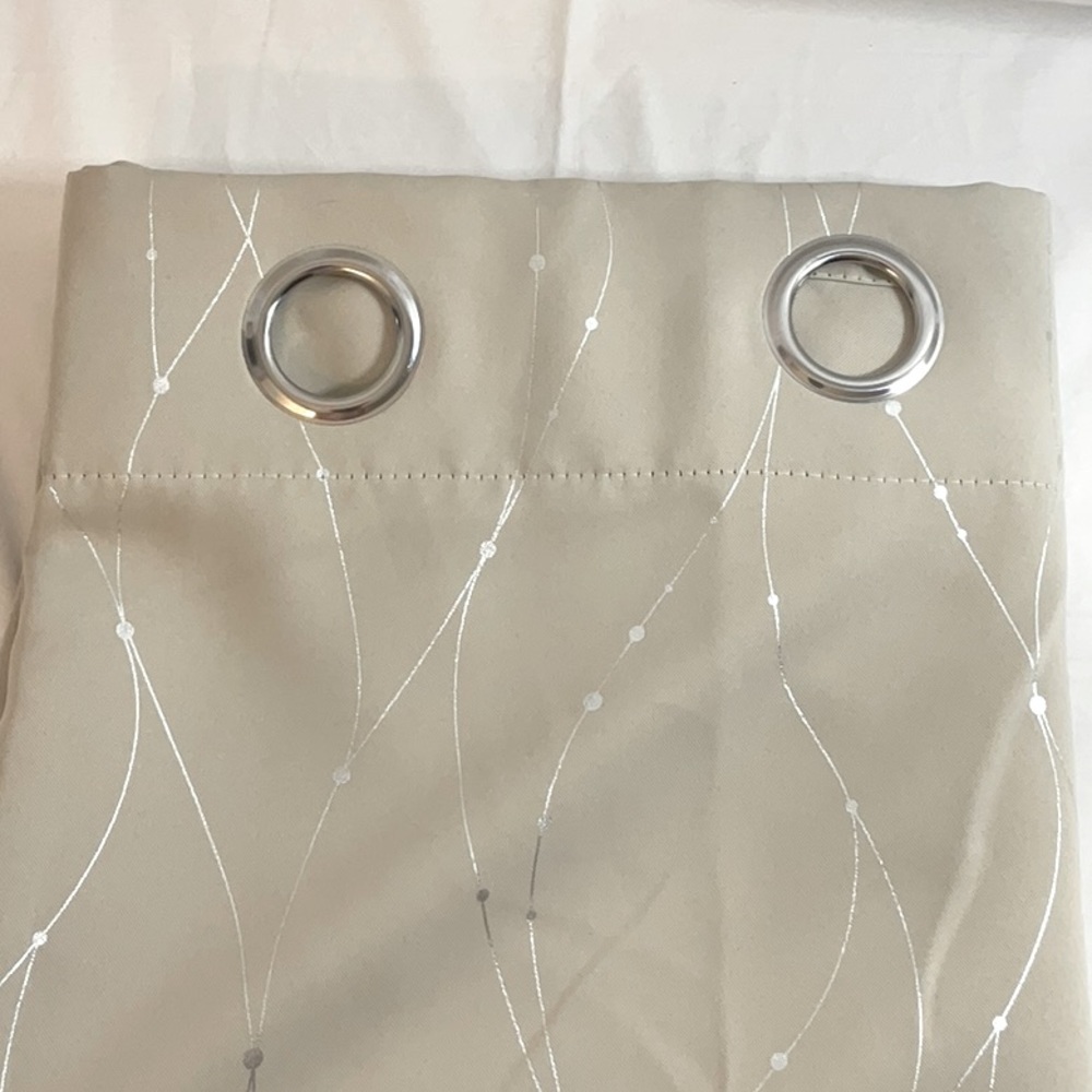 2 panels - curtains 52 x 92. 100% polyester. Sand color with silver accents.